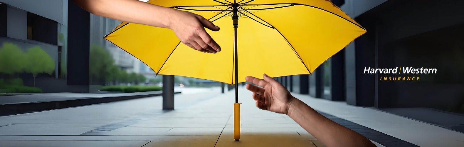 yellow umbrella in the street with hands reaching for eachother